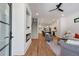 Bright living room with modern fireplace, hardwood floors, and open floor plan at 1464 Ezra Church Nw Dr, Atlanta, GA 30314