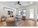 Bright living room with modern furniture, hardwood floors, and natural light at 1464 Ezra Church Nw Dr, Atlanta, GA 30314