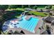 Aerial view of the community pool featuring swimming lanes, water features and sunbathing areas at 1530 Avalon Creek Rd, Sugar Hill, GA 30518
