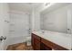 Bathroom with a shower-tub combo, stylish vanity, and tile flooring at 1530 Avalon Creek Rd, Sugar Hill, GA 30518