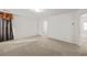 Bedroom featuring carpeted flooring and neutral wall color at 1530 Avalon Creek Rd, Sugar Hill, GA 30518