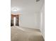 Spacious carpeted bonus room with window and neutral walls at 1530 Avalon Creek Rd, Sugar Hill, GA 30518