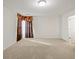 Bright carpeted bonus room with natural light and neutral decor at 1530 Avalon Creek Rd, Sugar Hill, GA 30518