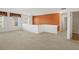 A well-lit carpeted bonus room with bright walls, windows, and open layout at 1530 Avalon Creek Rd, Sugar Hill, GA 30518