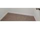 This carpeted area has white trim and white walls at 1530 Avalon Creek Rd, Sugar Hill, GA 30518