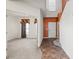 Welcoming entryway with warm-toned walls and a glimpse into the carpeted living space with natural light at 1530 Avalon Creek Rd, Sugar Hill, GA 30518