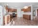 Well-equipped kitchen features stainless steel appliances, ample cabinet space, and durable flooring at 1530 Avalon Creek Rd, Sugar Hill, GA 30518