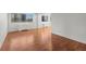 Spacious living area features gleaming hardwood floors and neutral walls at 215 Piedmont Ne Ave # 1608, Atlanta, GA 30308