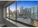 City skyline view from inside a condo with floor to ceiling windows at 215 Piedmont Ne Ave # 1608, Atlanta, GA 30308