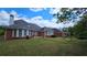 Spacious backyard with lush green grass, perfect for entertaining or relaxing outdoors at 2604 Harman Park Cir, Duluth, GA 30097