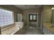 Bright bathroom featuring a soaking tub, separate shower, and double vanity at 2604 Harman Park Cir, Duluth, GA 30097