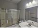 Bathroom with a double sink vanity and a shower and tub combination at 2604 Harman Park Cir, Duluth, GA 30097