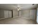 Spacious carpeted bedroom with neutral walls, featuring ample closet space and natural light at 2604 Harman Park Cir, Duluth, GA 30097