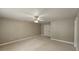 Neutral bedroom featuring carpet, a ceiling fan, and a closet at 2604 Harman Park Cir, Duluth, GA 30097