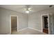 Bedroom featuring doorways to a walk-in closet and an ensuite bathroom at 2604 Harman Park Cir, Duluth, GA 30097