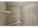 Walk-in closet with ample shelving and storage space at 2604 Harman Park Cir, Duluth, GA 30097