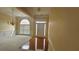Foyer featuring a chandelier, arch window, and entry door with sidelights at 2604 Harman Park Cir, Duluth, GA 30097