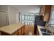 Kitchen with island, stainless steel appliances and hardwood flooring at 2604 Harman Park Cir, Duluth, GA 30097