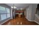 Bright kitchen features stainless steel appliances, wood cabinets, a kitchen island, and hardwood floors at 2604 Harman Park Cir, Duluth, GA 30097