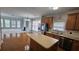 Modern kitchen with island, stainless steel appliances and hardwood flooring at 2604 Harman Park Cir, Duluth, GA 30097