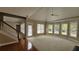 Spacious living room featuring plush carpeting, a ceiling fan, and windows for natural light at 2604 Harman Park Cir, Duluth, GA 30097