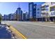 Modern apartments with balconies line the street, offering urban living at 260 18Th Nw St # 10302, Atlanta, GA 30363