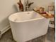 Modern bathroom with a freestanding tub and stylish decorative elements at 260 18Th Nw St # 10302, Atlanta, GA 30363