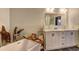 Modern bathroom featuring a double vanity with white cabinets at 260 18Th Nw St # 10302, Atlanta, GA 30363