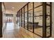 Hallway with a view of the shared workspace with modern decor and wooden floors at 260 18Th Nw St # 10302, Atlanta, GA 30363