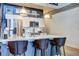 Modern kitchen with white cabinets, stainless steel appliances, and bar stool seating at the island at 260 18Th Nw St # 10302, Atlanta, GA 30363