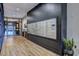 Hallway with modern lighting, flooring, and a wall of mailboxes for residents at 260 18Th Nw St # 10302, Atlanta, GA 30363