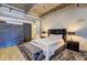 Comfortable bedroom featuring a luxurious tufted headboard and modern decor at 260 18Th Nw St # 10302, Atlanta, GA 30363