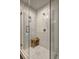 Sleek shower with glass enclosure and tiled walls, complemented by a modern bench at 260 18Th Nw St # 10302, Atlanta, GA 30363