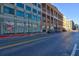 Street view of the property with stores and residences at 260 18Th Nw St # 10302, Atlanta, GA 30363