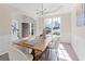 Bright dining room featuring hardwood floors, a chandelier, and access to the foyer at 3637 Green Pine Way, Suwanee, GA 30024