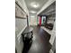 Inviting entryway with hardwood floors, elegant decor, and views into the dining room at 5215 Tye Trl, Fairburn, GA 30213