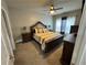 Main bedroom with ceiling fan, ample natural light, and neutral decor at 5215 Tye Trl, Fairburn, GA 30213