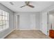 Bedroom with neutral walls, carpet, and adjoining bathroom at 5660 Garden Cir, Douglasville, GA 30135