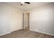 Charming bedroom featuring a closet, new floors, neutral walls, and a ceiling fan for ultimate comfort at 1312 La Mesa Dr, Lawrenceville, GA 30043