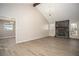 Spacious living room boasts a stone fireplace, laminate floors, and bright windows at 1312 La Mesa Dr, Lawrenceville, GA 30043
