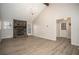 Spacious living room boasts a stone fireplace, laminate floors, and bright windows at 1312 La Mesa Dr, Lawrenceville, GA 30043