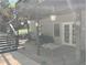 View of deck stairs, a closed patio, and a door to the interior at 1470 Sweet Bottom Sw Cir, Marietta, GA 30064