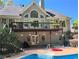Picture of a deck, hot tub, and pool area with view of multiple windows and door to the home's interior at 1470 Sweet Bottom Sw Cir, Marietta, GA 30064