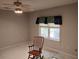 Bedroom features a rocking chair and window at 1470 Sweet Bottom Sw Cir, Marietta, GA 30064