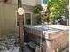 Close up of hot tub with cover and steps plus a window at 1470 Sweet Bottom Sw Cir, Marietta, GA 30064