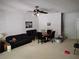 Spacious living room featuring a ceiling fan and furniture at 1470 Sweet Bottom Sw Cir, Marietta, GA 30064