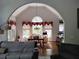 Bright living area with archways, a dining area, and large windows offering natural light at 1470 Sweet Bottom Sw Cir, Marietta, GA 30064