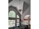 Spacious living room showcasing the high vaulted ceiling and large arched windows at 1470 Sweet Bottom Sw Cir, Marietta, GA 30064