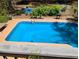 Clean pool with a patio area and grill and wooded backyard at 1470 Sweet Bottom Sw Cir, Marietta, GA 30064