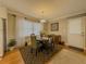 Cozy dining area with natural light, stylish furnishings and decorative accents at 1894 Dogwood Ct, Snellville, GA 30078